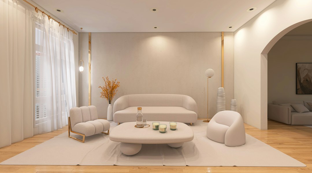 Bright and airy modern living room, staged with minimalist furniture and neutral colors to appeal to potential home buyers.